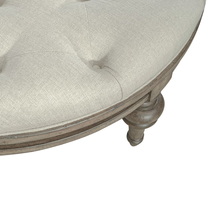 Americana Farmhouse Round Cocktail Ottoman in Dusty Taupe - Furniture House (VA)